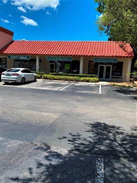 More Photos Of 13833-13897 Wellington Ter, Wellington General Retail For Lease