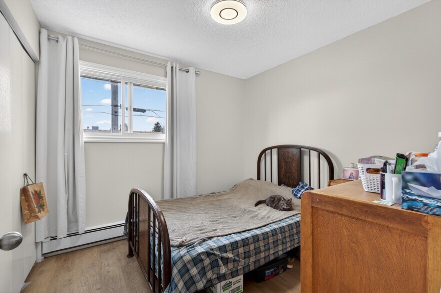 More Photos Of 5015 48 St, Legal Apartments For Sale