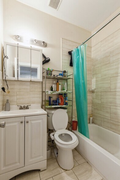 More Photos Of 100-10-100-12 103rd Ave, Ozone Park Multifamily For Sale