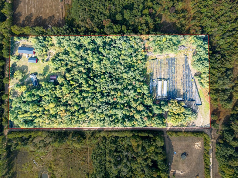 Primary Photo Of 5852 NW County Line Rd, Coleman Warehouse For Sale