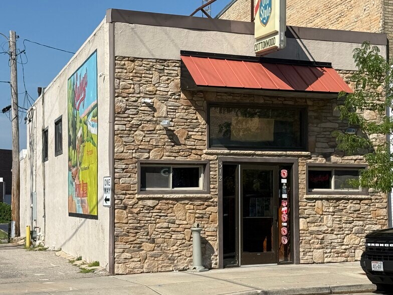 Primary Photo Of 312 Dewitt St, Portage General Retail For Sale