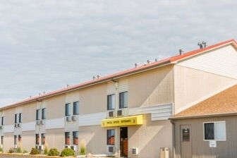 Primary Photo Of 1202 S Kniss Ave, Luverne Hotel For Sale