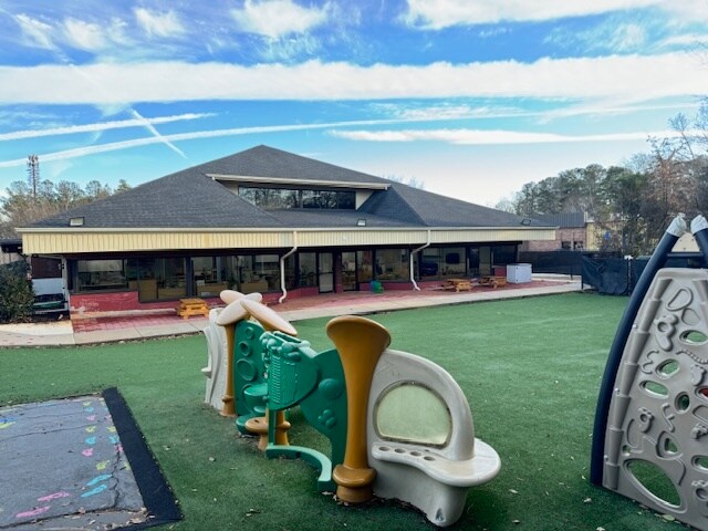 Primary Photo Of 205 Market Pl, Roswell Schools For Sale