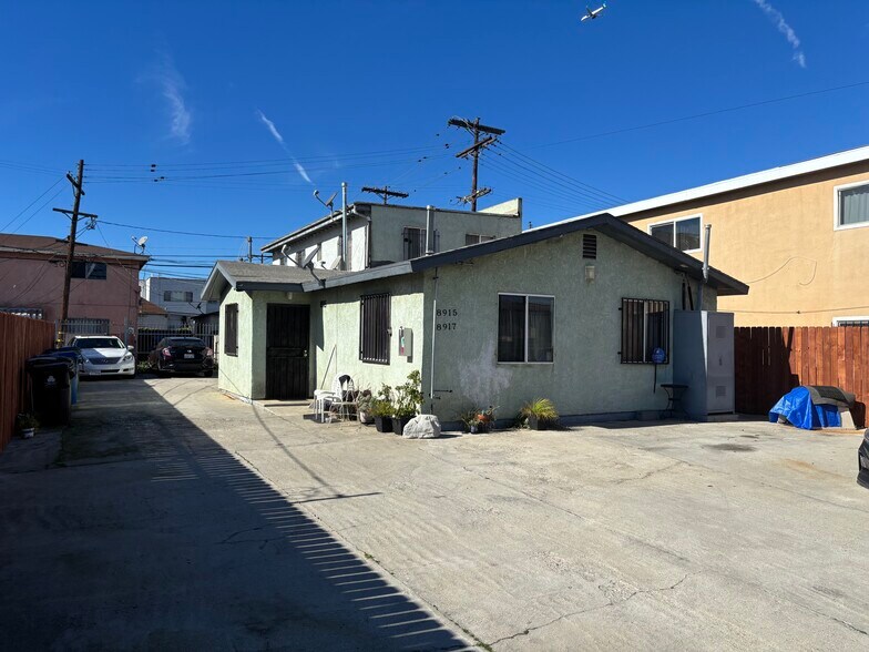 Primary Photo Of 8915 S Normandie Ave, Los Angeles Multifamily For Sale