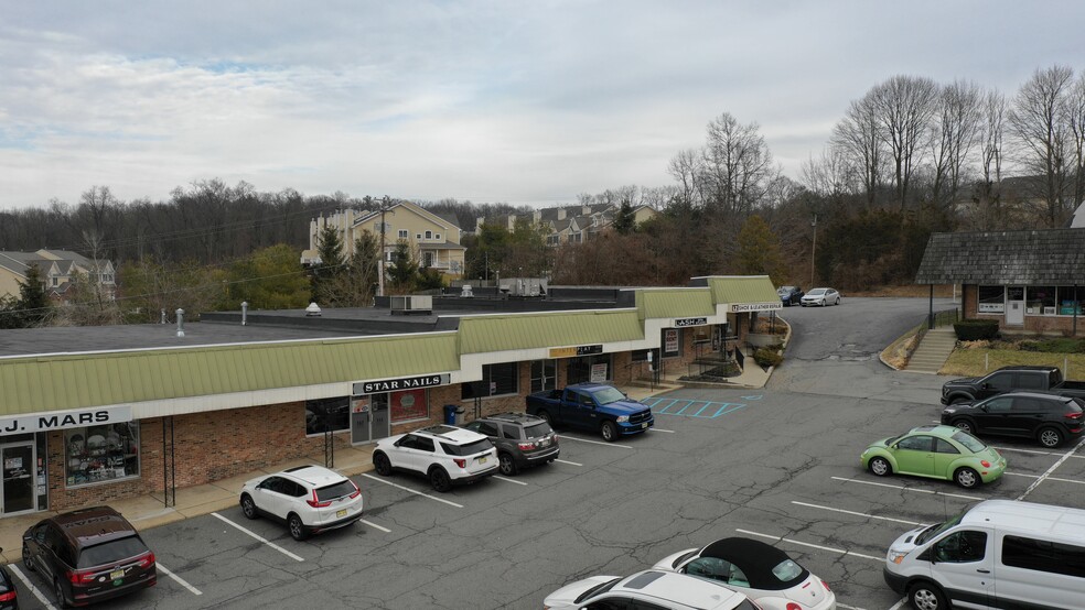 Primary Photo Of 37 Theatre Ctr, Sparta General Retail For Sale