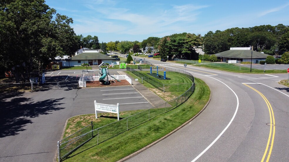 Primary Photo Of 9-10 Glenmere Ln, Coram General Retail For Sale