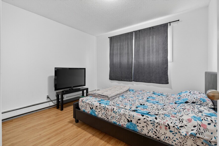 More Photos Of 5015 48 St, Legal Apartments For Sale