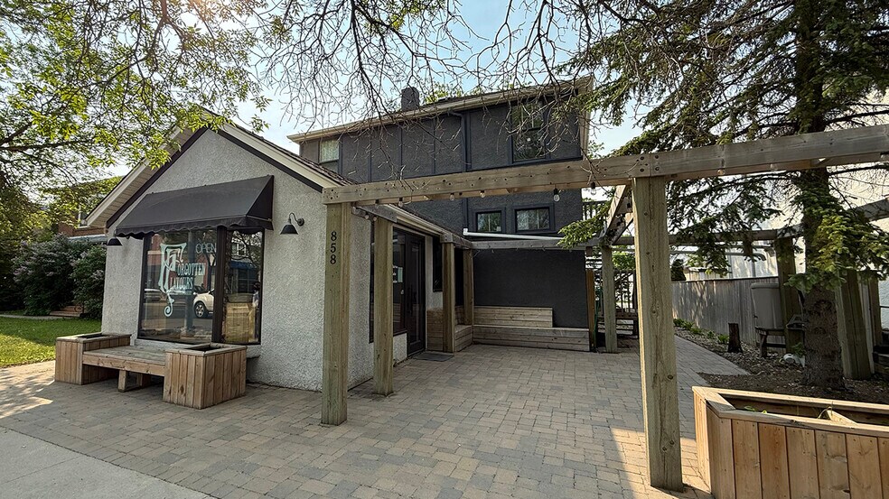 Primary Photo Of 858 Corydon Av, Winnipeg Freestanding For Sale