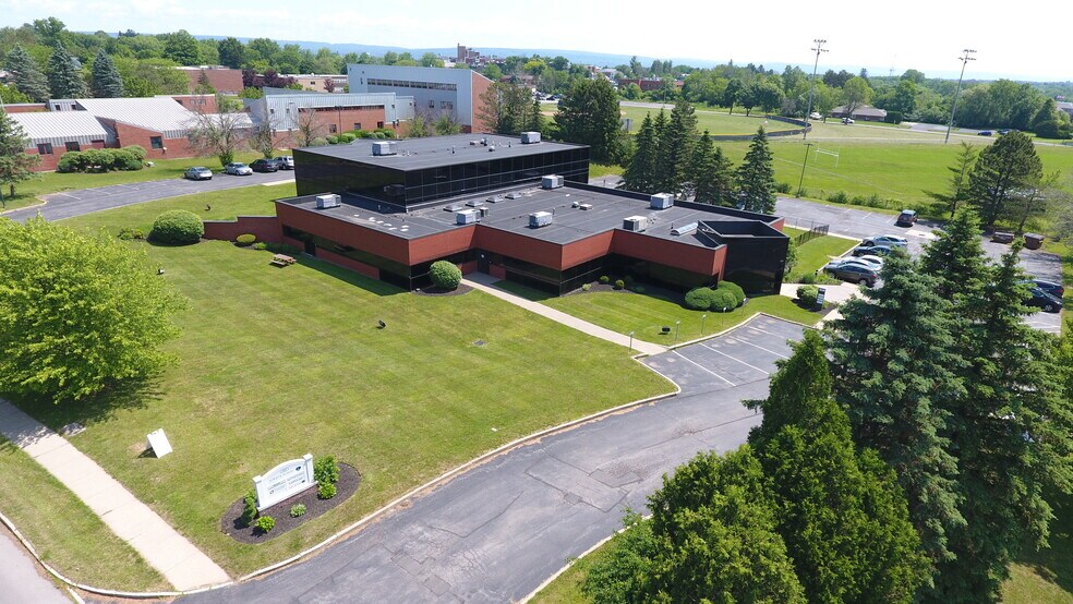 Primary Photo Of 122 Business Park Dr, Utica Medical For Sale