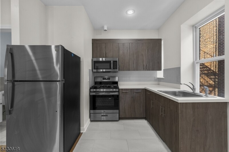 More Photos Of 396 E Kinney St, Newark Apartments For Sale