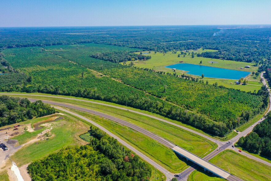 More Photos Of FM 1010 @ Loop 105, Cleveland Land For Sale