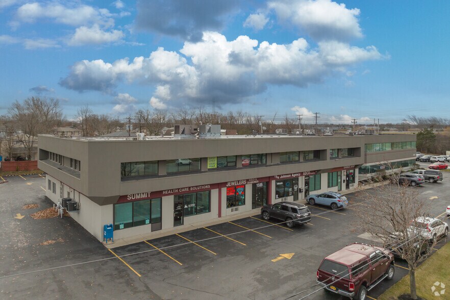 Primary Photo Of 1321-1325 Millersport Hwy, Amherst Office For Lease