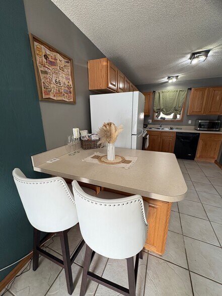 More Photos Of 109-111 Commercial St, Warrensburg Apartments For Sale
