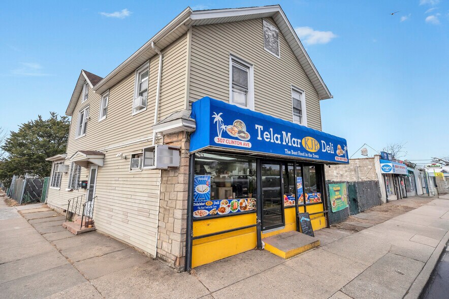 Primary Photo Of 307 Clinton St, Hempstead Storefront Retail Residential For Sale