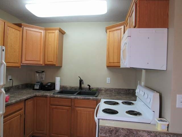 More Photos Of 681 7th St SW, Halliday Hotel For Sale