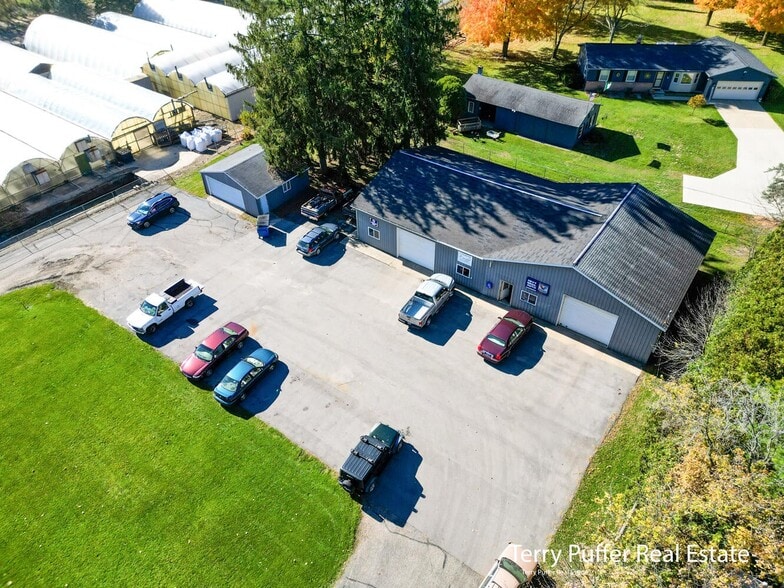 Primary Photo Of 283 N State St, Sparta Auto Repair For Sale