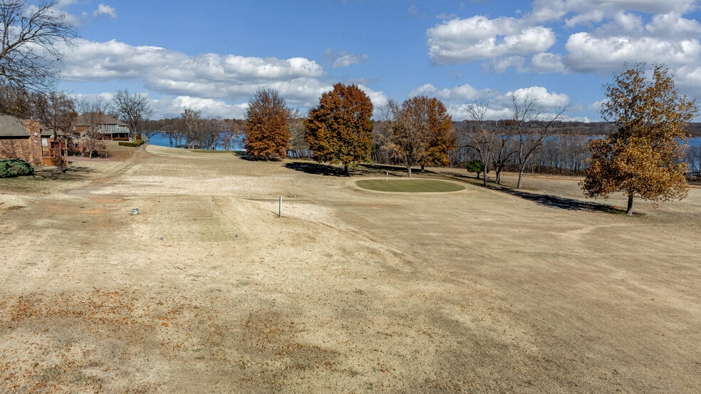 More Photos Of 519 Quail Run Rd, Grove Golf Course Driving Range For Sale