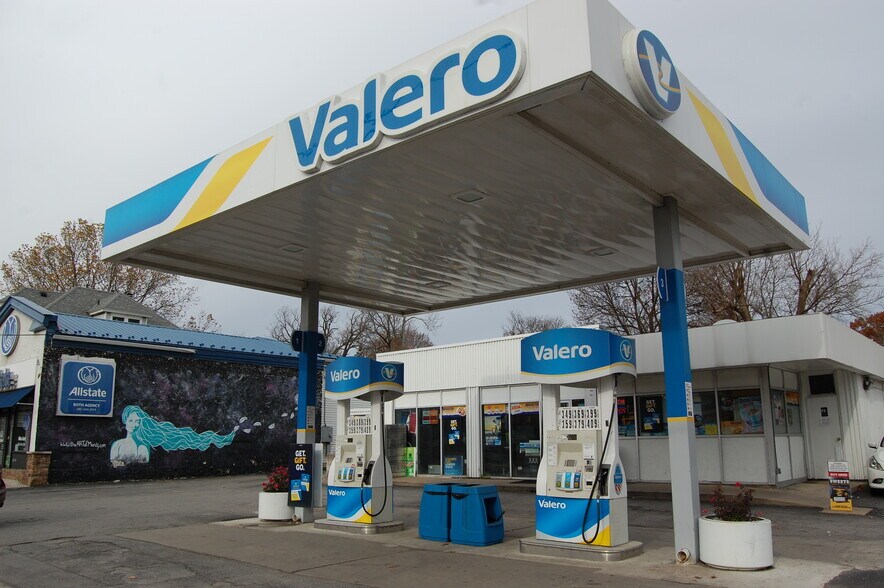 Primary Photo Of 100 W Main St, Batavia Convenience Store For Sale