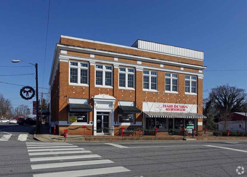 Primary Photo Of 101 E 1st St, Lowell Storefront Retail Office For Sale