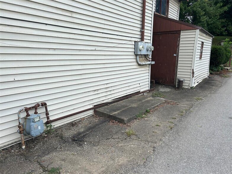 More Photos Of 13087 Main st, Titusville Storefront Retail Residential For Sale