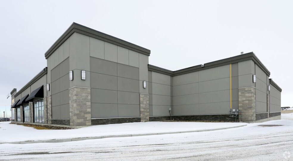 More Photos Of 100 Rainbow Rd, Chestermere Freestanding For Lease