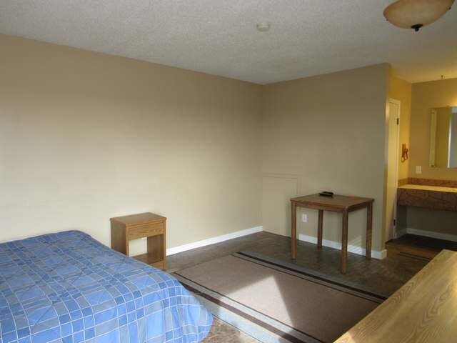 More Photos Of 681 7th St SW, Halliday Hotel For Sale