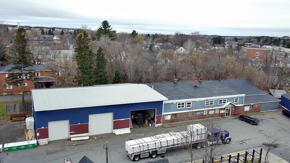 Primary Photo Of 43 State St, Presque Isle General Retail For Sale