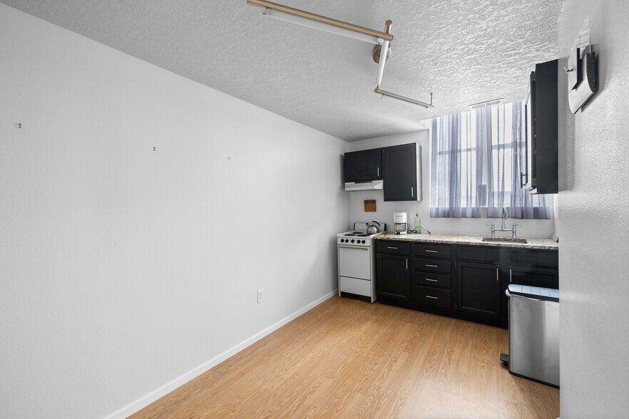 More Photos Of 104 1st Ave E, Newton Apartments For Sale