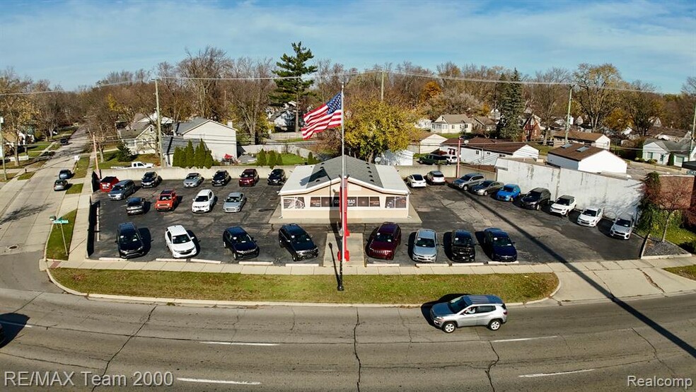 Primary Photo Of 29666 Grand River Ave, Farmington Hills Auto Dealership For Sale