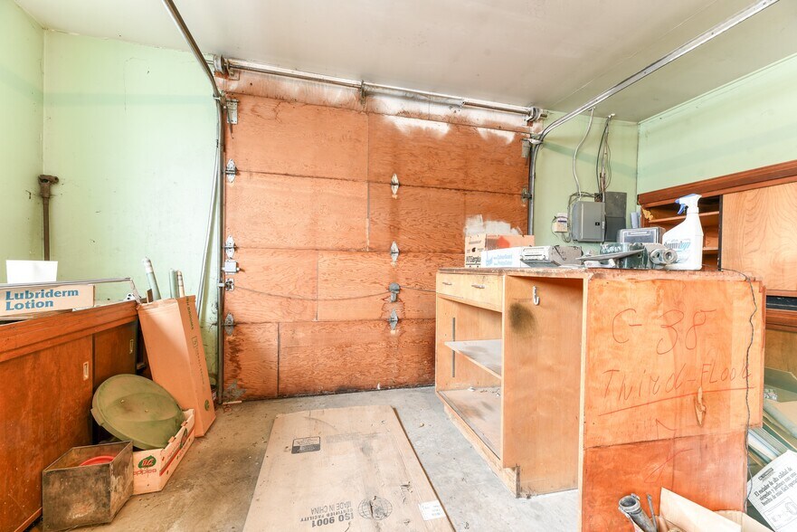 More Photos Of 228 Centre St NE, Langdon Flex For Sale