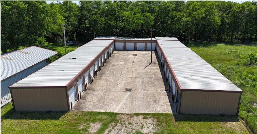 More Photos Of 118 E US Highway 69, Point Self Storage For Sale