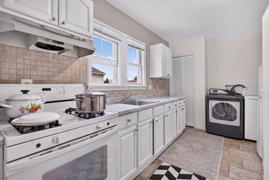 More Photos Of 323 Semel Ave, Garfield Storefront Retail Residential For Sale
