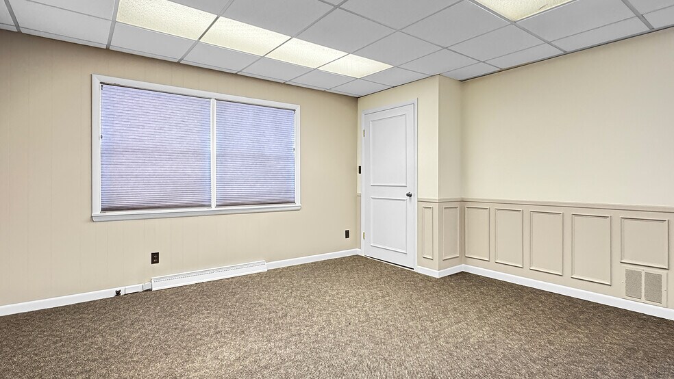 More Photos Of 118 Stimson St, Cadillac Office For Sale