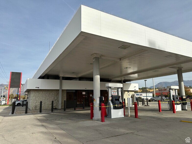 Primary Photo Of 1055 W Riverdale Rd, Riverdale General Retail For Sale