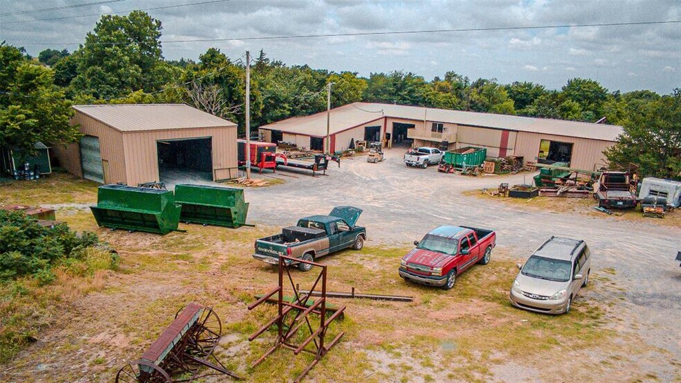 Primary Photo Of 27113 County Road 1442, Cement Warehouse For Sale