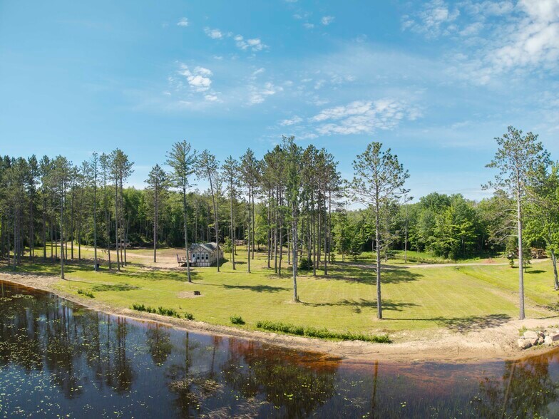 More Photos Of 8767 S Lyman Lake Rd, South Range Land For Sale