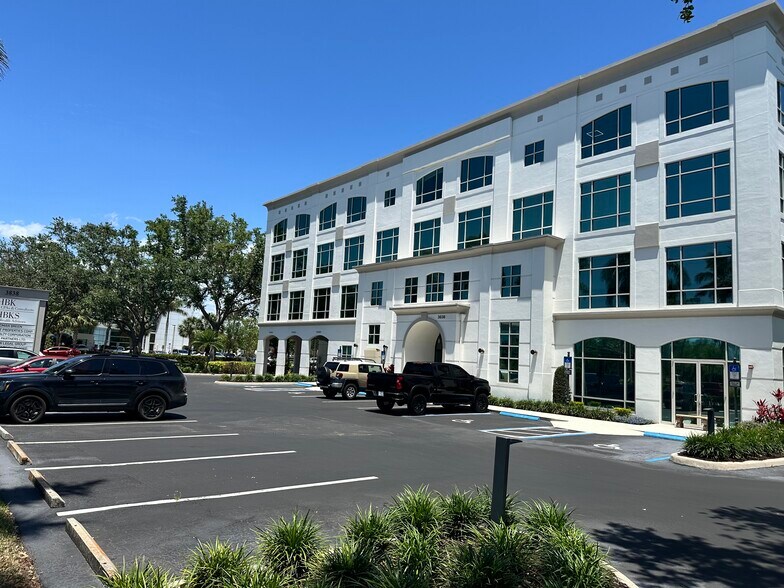 Primary Photo Of 3838 Tamiami Trl N, Naples Office For Lease