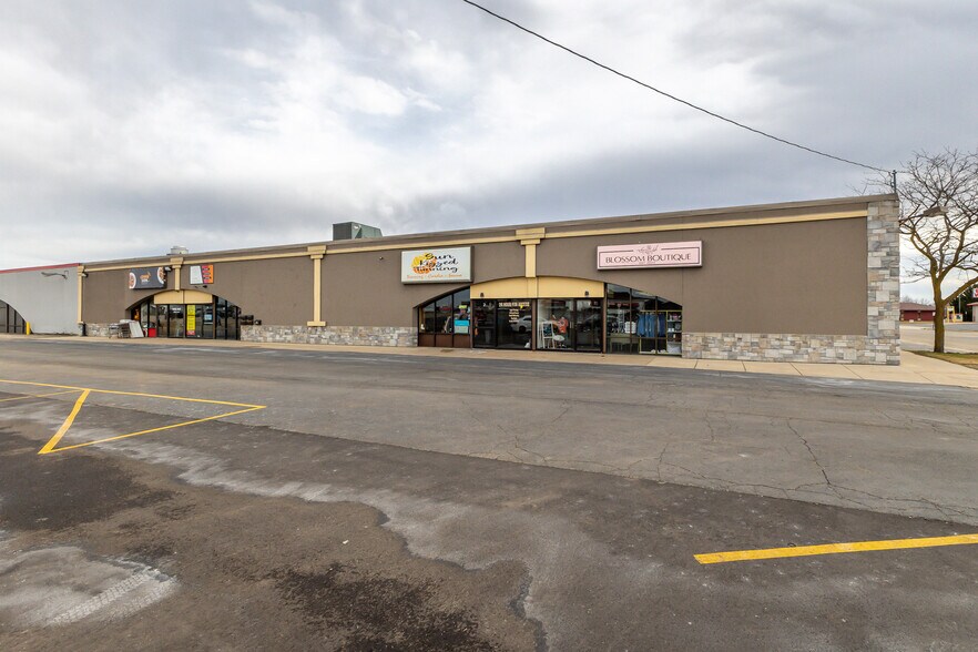 Primary Photo Of 128 W 8th St, Monroe General Retail For Sale