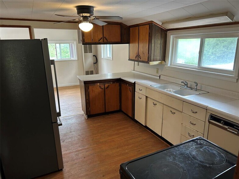 More Photos Of 13087 Main st, Titusville Storefront Retail Residential For Sale