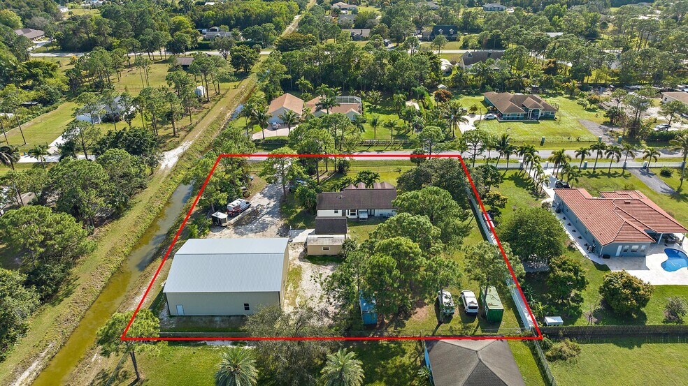 Primary Photo Of 15287 75th Ln N, Westlake Warehouse For Sale