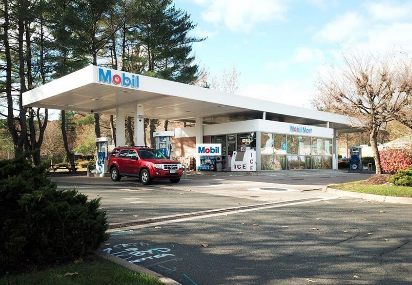 Primary Photo Of 411 W Main St, Avon Service Station For Sale