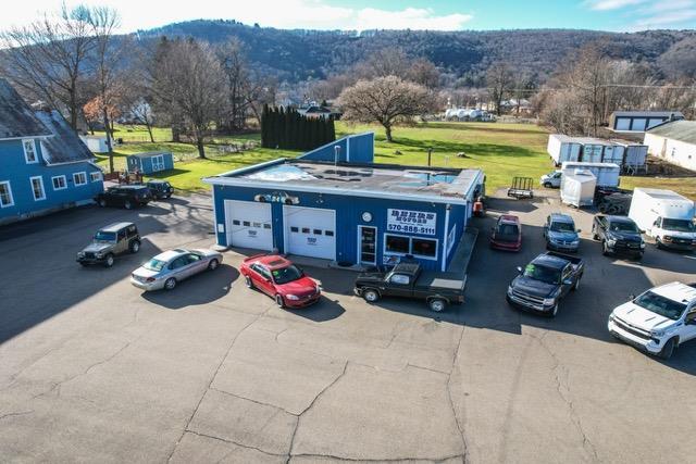 Primary Photo Of 110 S Main St, Athens Auto Dealership For Sale