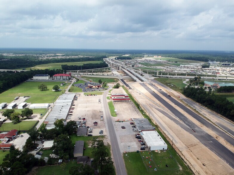 Primary Photo Of 22480-22606 Community Dr, New Caney Freestanding For Lease