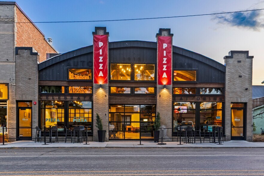 Primary Photo Of 114 E Main St, Manhattan Storefront Retail Office For Sale