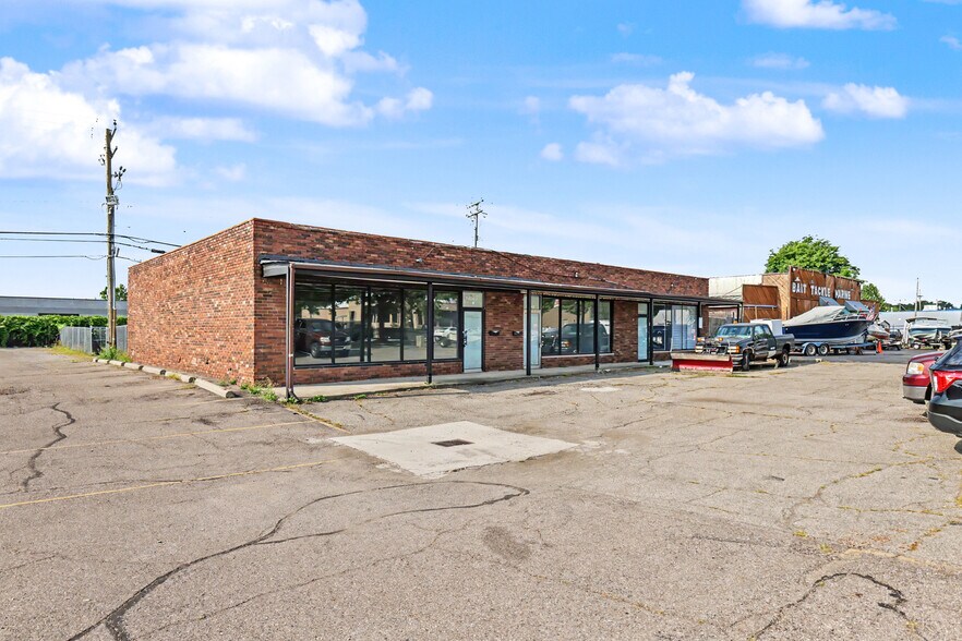 Primary Photo Of 22909-22917 Van Born Rd, Taylor Freestanding For Sale