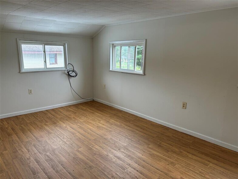 More Photos Of 13087 Main st, Titusville Storefront Retail Residential For Sale