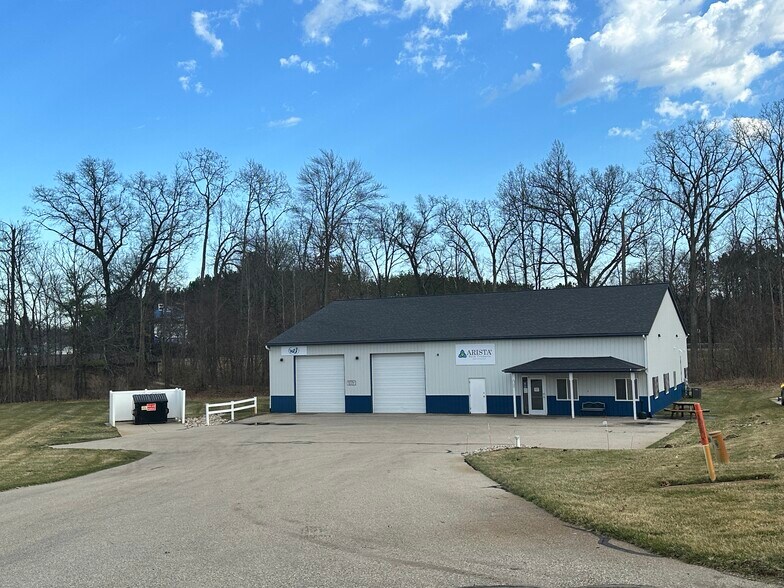 Primary Photo Of 4100 Cedar Commercial Dr NE, Cedar Springs Warehouse For Sale