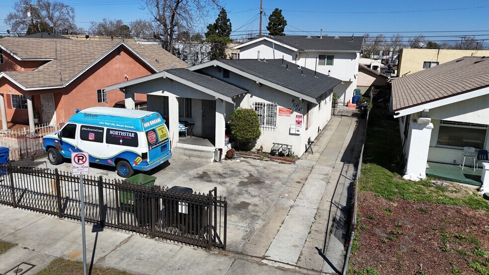 Primary Photo Of 1049 W 61st St, Los Angeles Apartments For Sale