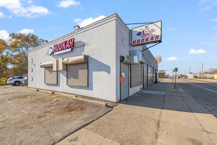 Primary Photo Of 7606 E 7 Mile Rd, Detroit Storefront For Sale