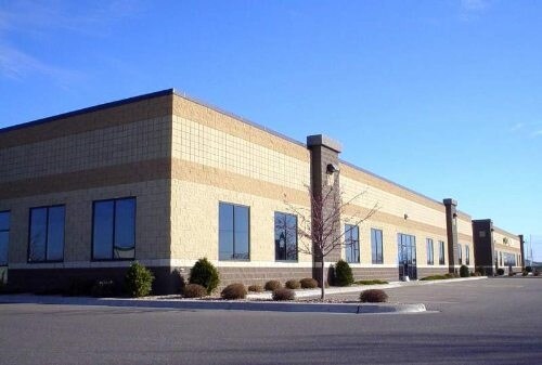 More Photos Of 14140-14198 Northdale Blvd, Rogers Showroom For Lease